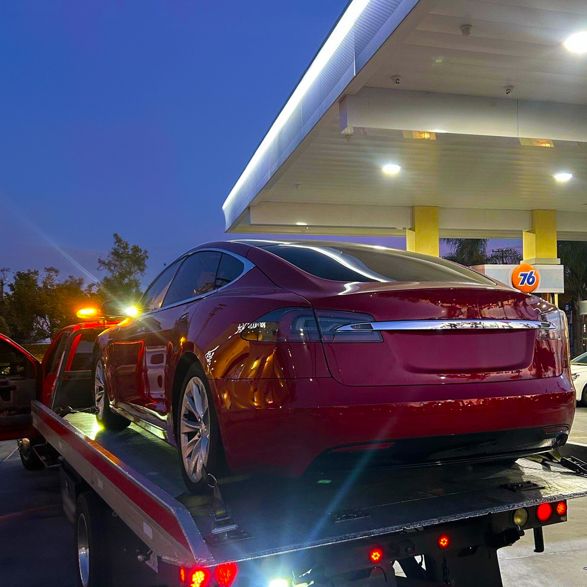 EV Towing with Flatbed Truck